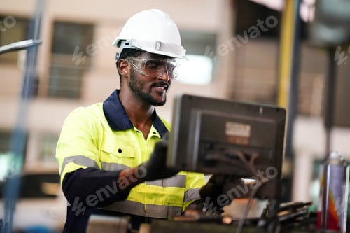 Preview: industrial factory worker working in metal manufacturing industry