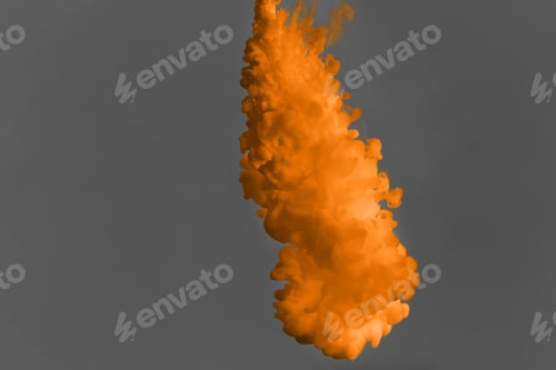 Preview: Splash of orange ink on grey background