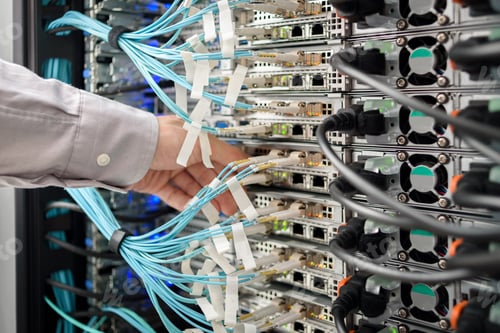 Preview: Man data center technician performing server maintenance