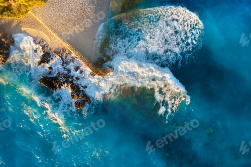 Preview: View from the air on the waves and rocks. Sea relaxation and travel. Azure water on the sea.