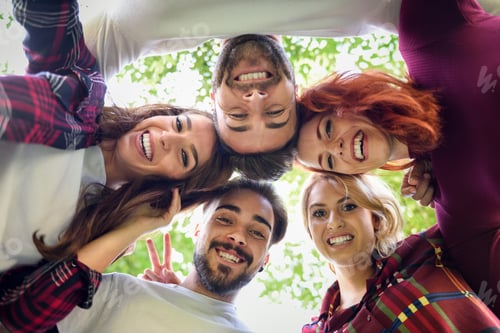 Preview: Group of young people together outdoors in urban background