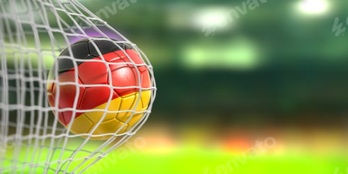 Preview: Football or soccer ball with flags of Germany in the net of goal of football stadium