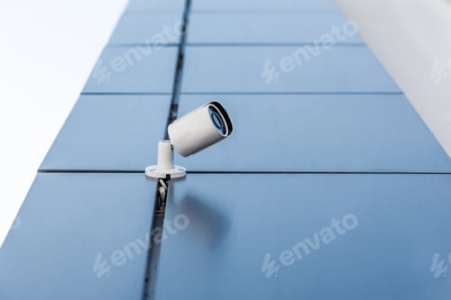Preview: one security camera on office building, security system concept