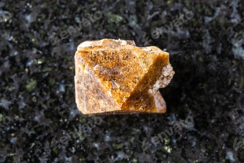 Preview: sample of single zircon crystal on black granite