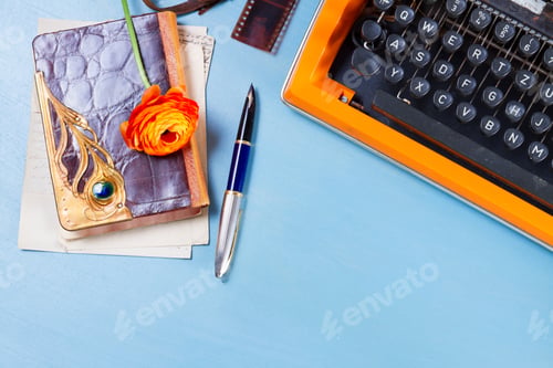 Preview: Workspace with vintage orange typewriter