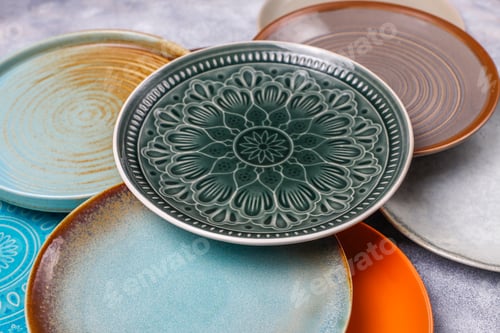 Preview: Different ceramic empty plates and bowls.