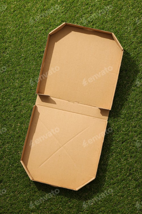 Preview: Ecological packaging for food delivery, on the grass.