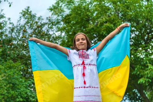 Preview: Children Ukrainian with a flag. Selective focus.