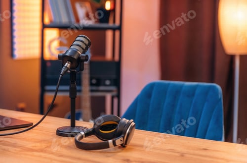 Preview: Microphone and headphones are on the table, room for podcasts