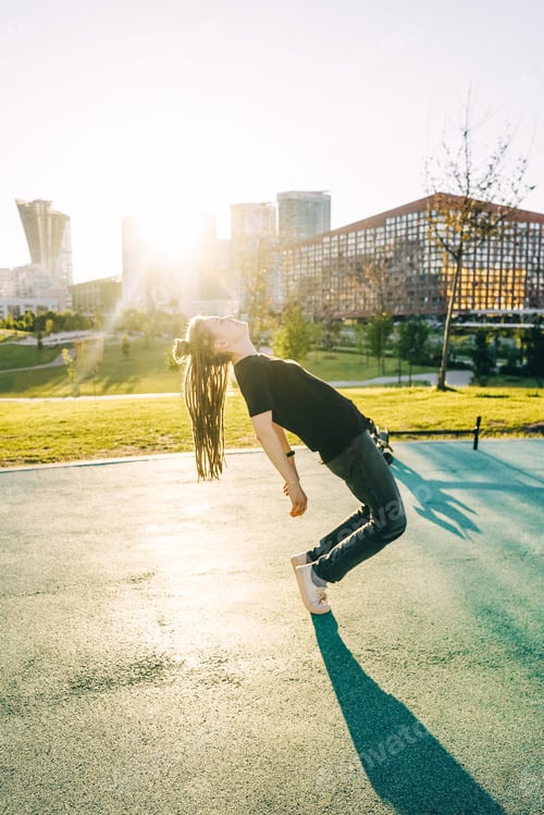 Preview: Woman with dreadlocks have fun in park