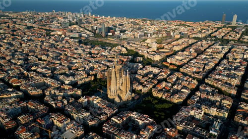 Preview: Aerial view of Barcelona city skyline, Basilica Sagrada Familia and Eixample residential urban grid
