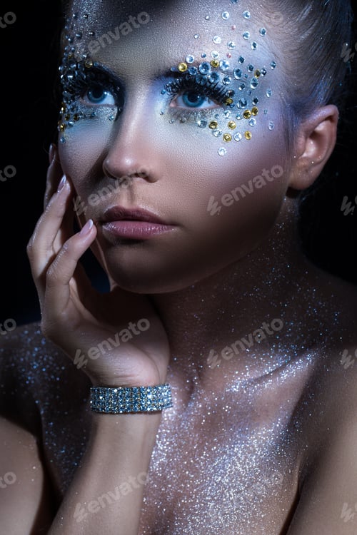 Preview: Attractive woman with artistic make-up