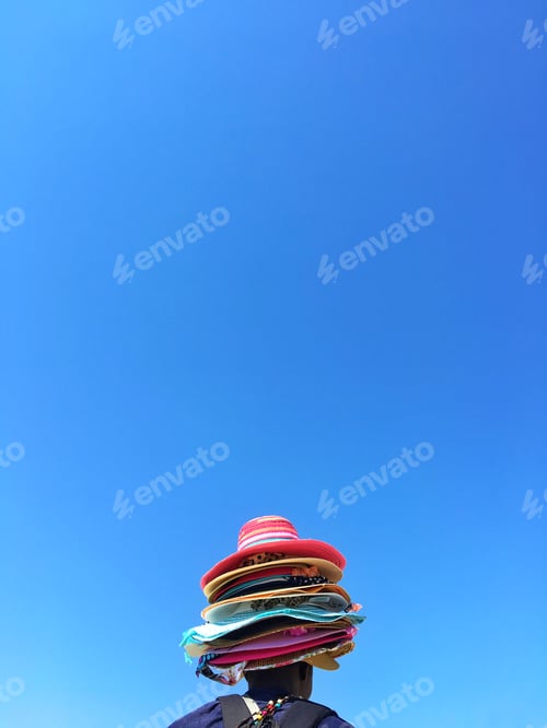 Preview: Colorful hats against blue sky