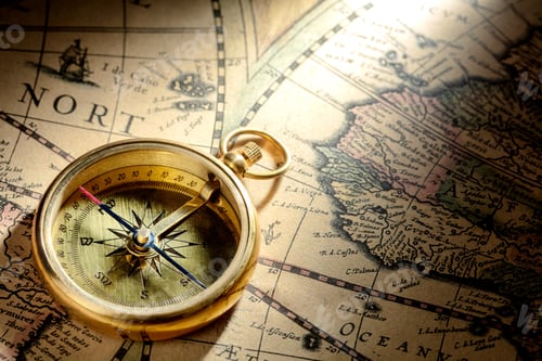 Preview: Antique compass on ancient map