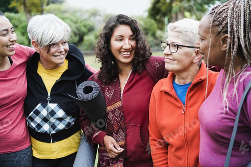 Preview: Happy multi generational women having fun together after sport workout outdoor