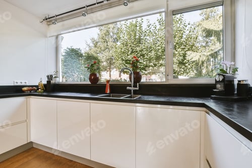 Preview: Interior of modern kitchen with white furniture