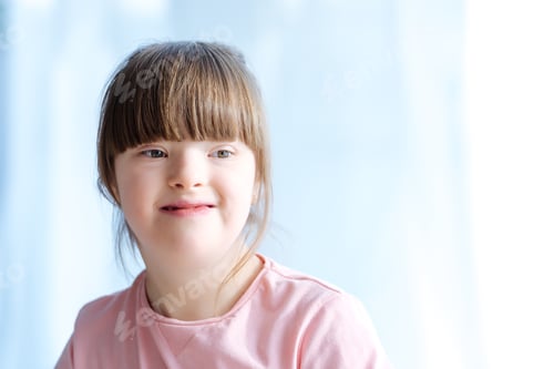 Preview: Portrait of cute kid with down syndrome