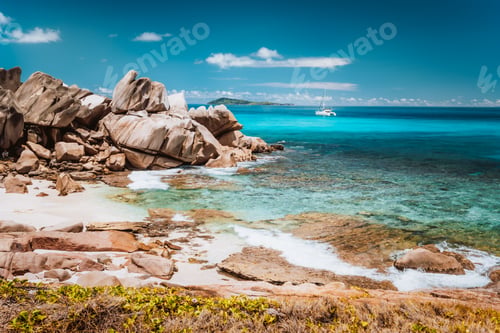Preview: Grand L Anse, La Digue, Seychelles. Tropical coastline with hidden beach, unique granite rocks and
