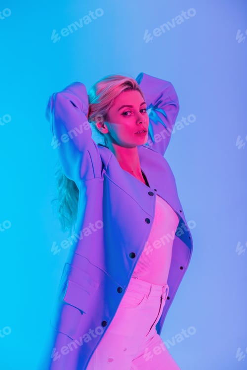 Preview: colors portrait of beautiful stylish woman model with fashionable blue blazer in studio
