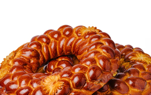 Preview: Baked sweet bread shaped in traditional round form with intricate design