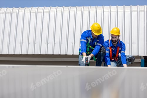 Preview: Engineer set installing and inspect standards of solar panels on roof of an industrial factory.