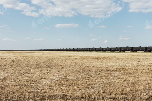 Preview: Oil train cars and fallow farmland, near Swift Current, Saskatchewan, Canada.
