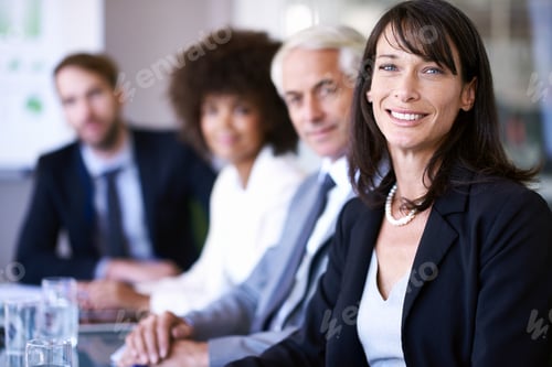 Preview: Business discussions. Cropped shot of a group of business colleagues meeting in the boardroom.
