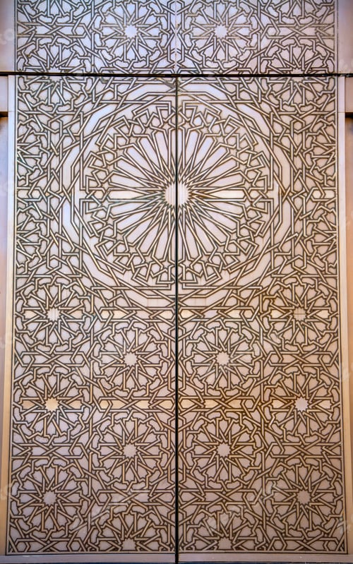 Ornate Geometric Islamic Design on Building Doors