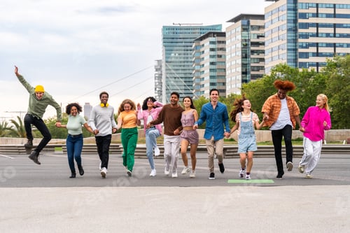 Preview: Happy playful multiethnic group of young friends bonding outdoors