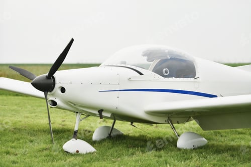 Preview: Mini white airplane at the airfield