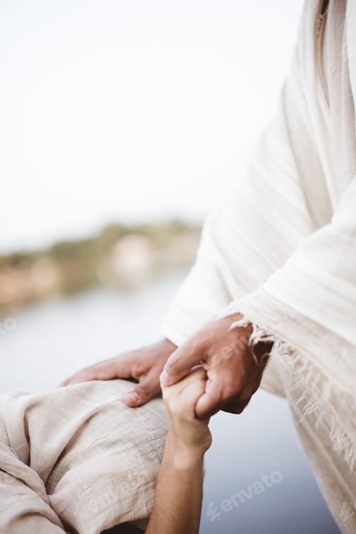 Preview: Vertical shot of Jesus Christ healing the female with a blurred background