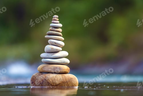 Preview: Close-up abstract image of wet rough natural brown uneven different sizes and forms stones