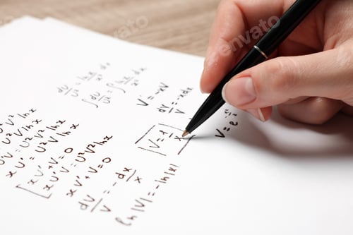 Preview: Student writing different mathematical formulas on paper, closeup