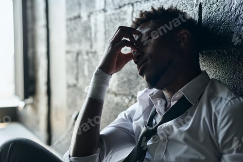 Preview: Man with bandaged wrists having depression