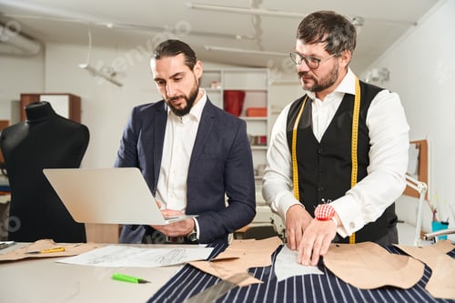 Preview: Fashion designers working on male clothing collection