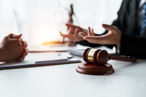 Preview: Lawyer discussing with client about contract, agreement, legal guideline, lawsuit. Lawyer work