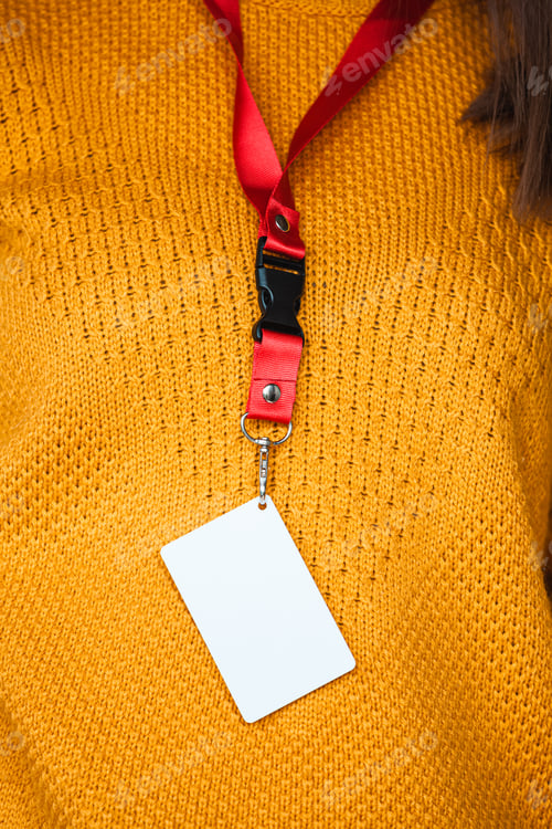 Preview: Woman holding badge name tag, with blank space mock up