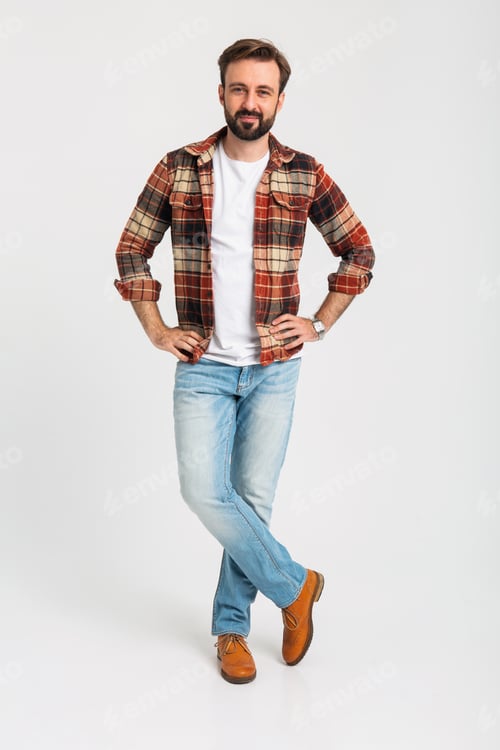 Preview: handsome bearded man in hipster outfit dressed in jeans and checkered shirt