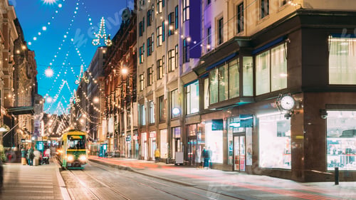 Preview: Helsinki, Finland. Tram Departs From Stop On Aleksanterinkatu Street. Kluuvi District In Evening Or