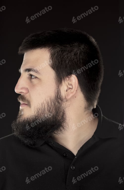 Preview: Profile View Of Portrait Of Young Guy With Large Beard.