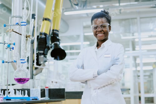 Preview: Portrait of Smiling Scientist Conducting Experiment
