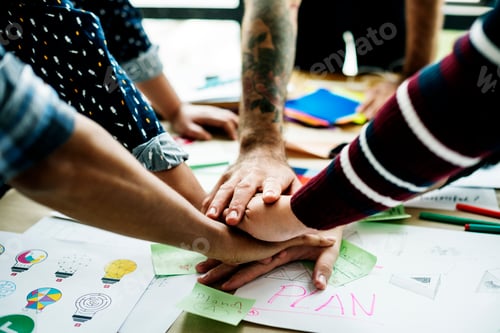 Preview: Colleagues meeting hand pile