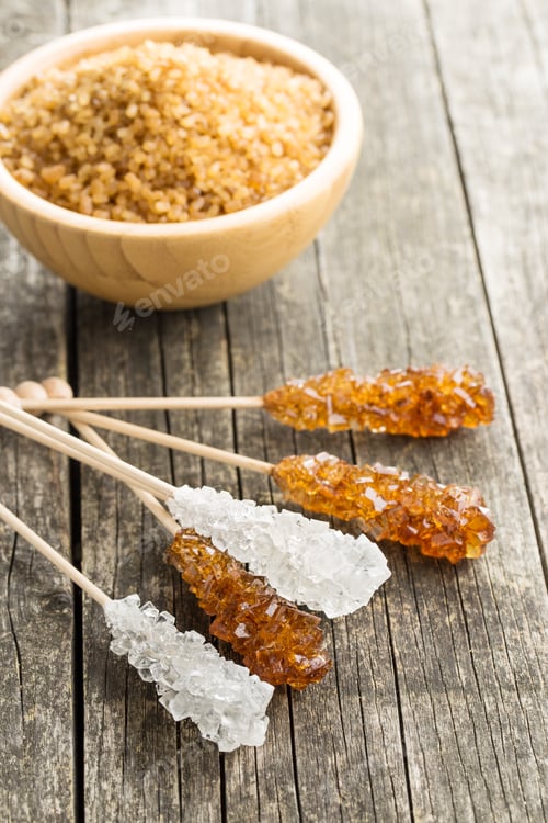 Preview: Crystalline sugar on wooden stick.