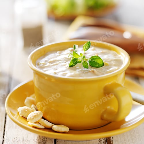 Preview: new england clam chowder in yellow bowl