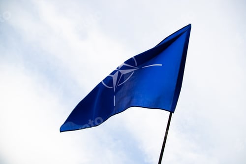 Preview: NATO flag.North Atlantic Treaty Organization flag waving.