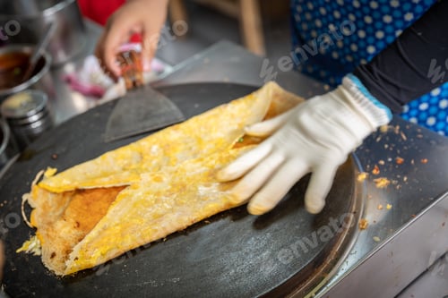 Preview: Folding savory egg pancakes in China