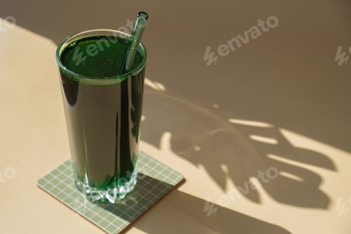 Preview: Organic blue-green algae spirulina detox drink in glass powder food. Health protein cocktail