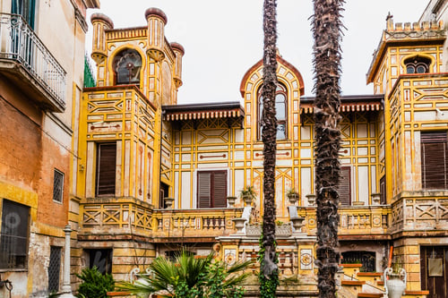 Preview: Facades of old Italian Mediterranean houses in Bari painted in colors.