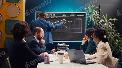 Preview: Project manager analyzing infographics to evaluate supply and demand