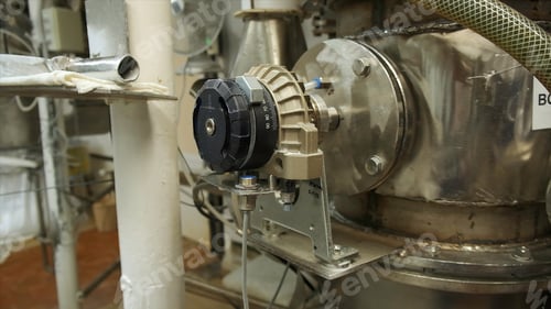 Preview: Close-up of rotating valve of industrial tank. Clip. Industrial pressure tank with rotating lid at